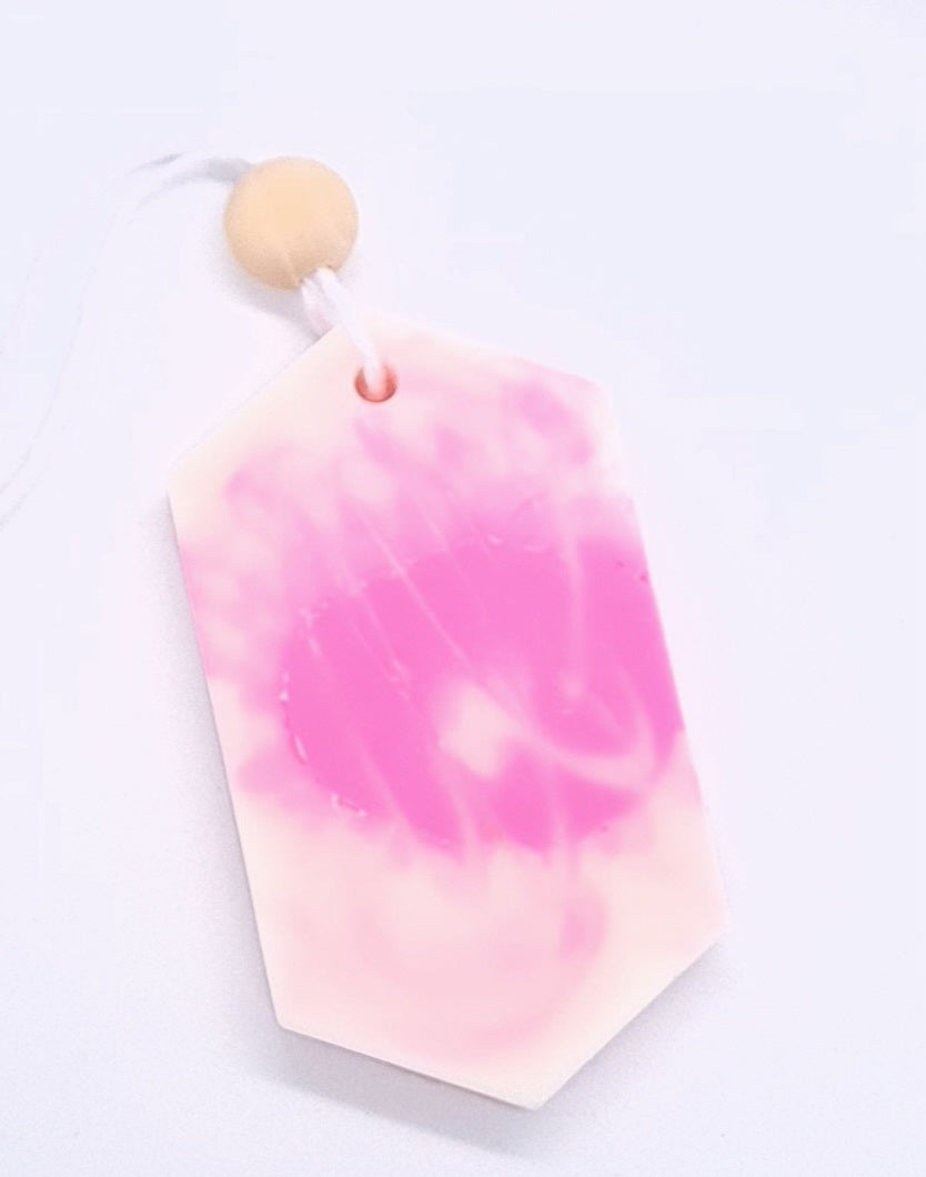 Suspension parfumée monoï